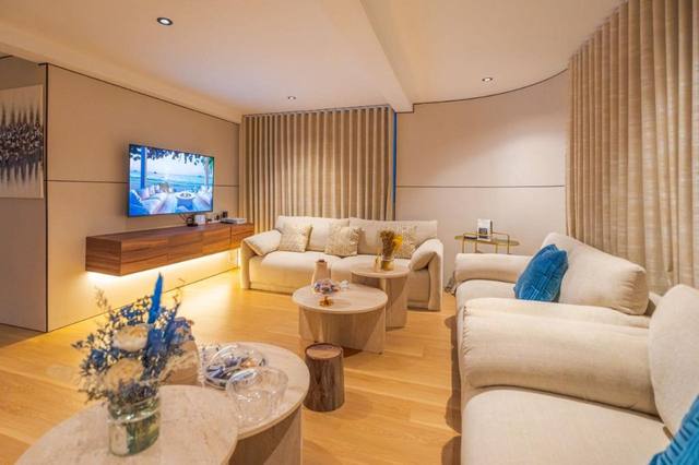 Media lounge in warm wood tones