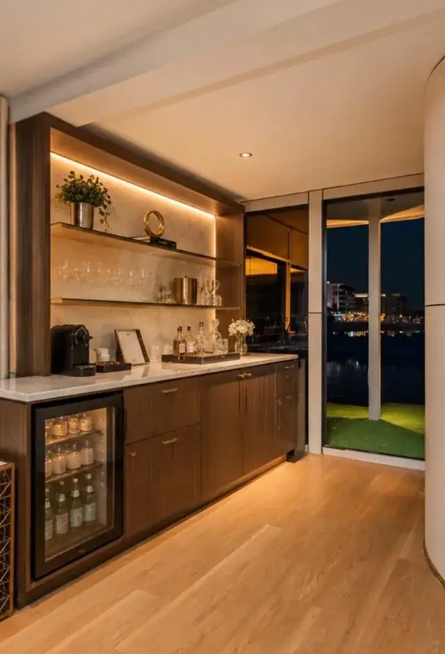 Wet bar and lounge with waterfront views