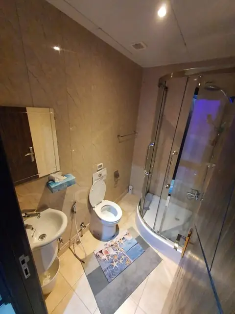 Bathroom with glass-enclosed shower
