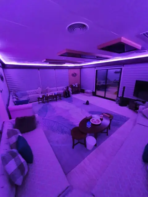 Main salon lounge with ambient lighting