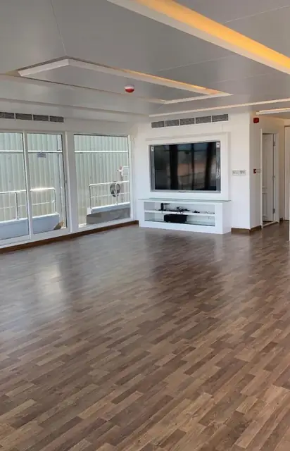 Entertainment lounge with wall-mounted TV